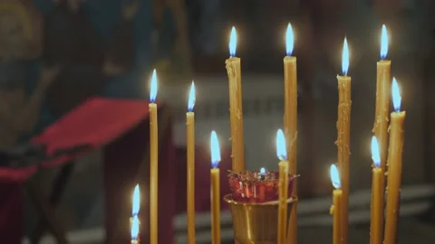 Candles on a candlestick in the temple. Stock Footage 130271602