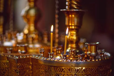 Candles in the candlestick in the temple Fotos de archivo