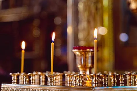 Candles in the candlestick in the temple Stock Photos