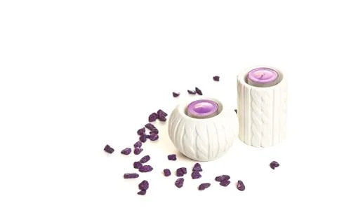 Candles in candlestick on a white background Stock Photos
