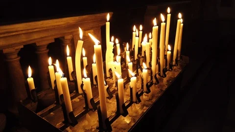 Candles in the churc in another point of view Stock Footage 120930042