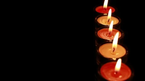 Candles in the dark (close up) - pan Stock Footage 8666607
