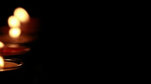 Candles in the dark (close up) - pan Stock Footage 8667406