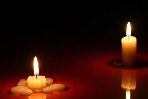 Candles on dark Stock Photos