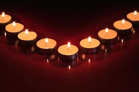 Candles on dark Stock Photos