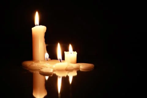 Candles On Dark Stock Photos