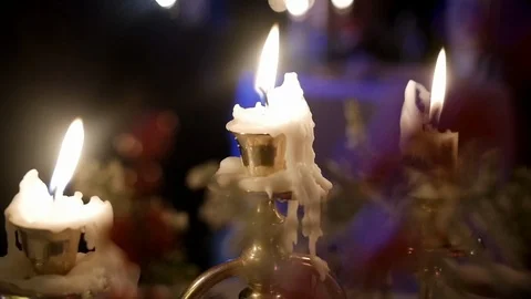 Candles flame close up on a dark background. Candle light close-up design Stock Footage 111518387