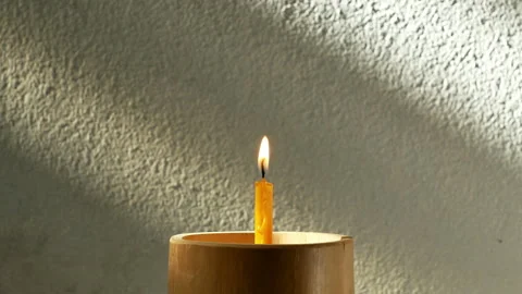 Candles flame on sunrise drop shadow. Stock Footage 148139042