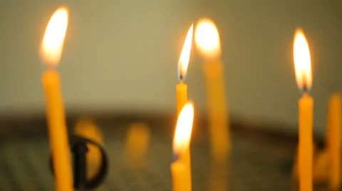 Candles flaming in candlestick Stock Footage 68626238