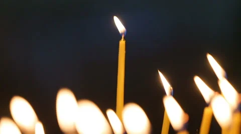 Candles flaming in candlestick Stock Footage 68627703