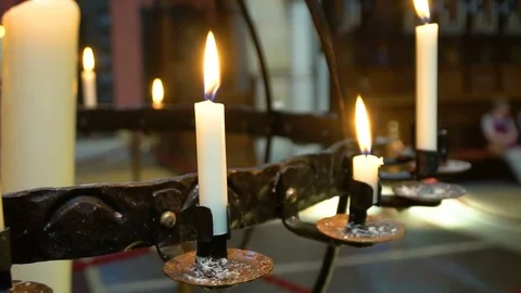 Candles flaming in candlestick Stock-Footage 76989593