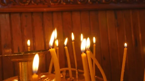 Candles flaming in candlestick Stock Footage 87185092