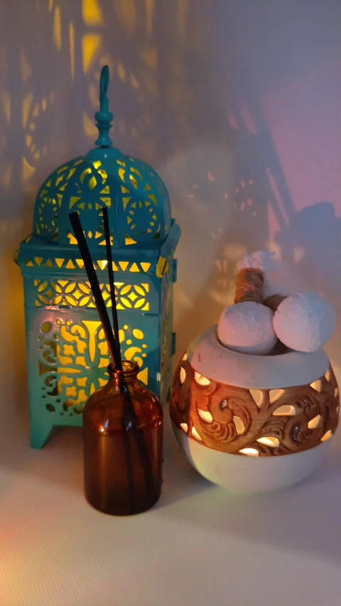 Candles flicker and incense close-up in the twilight Stock Footage 330130331