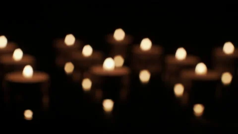 Candles Flickering out of Focus and Fade Out Stock Footage 153459337