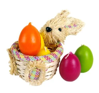 Candles in the form of easter eggs. Beautiful ornaments by a holiday. Stock Photos