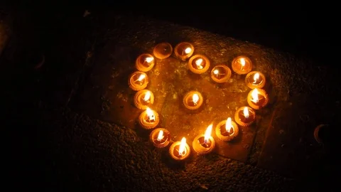 Candles Forming a Heart Stock Footage 81720412