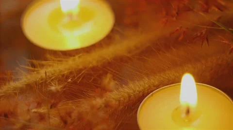 Candles with grass Stockbeeldmateriaal 67990466