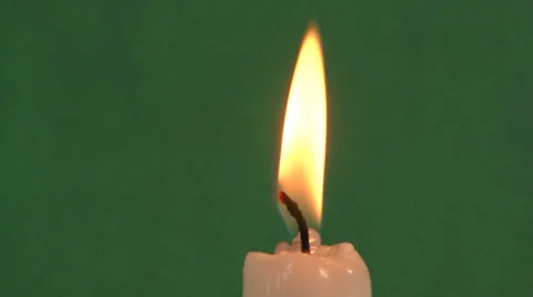 Candles on a green background Video stock 37345432