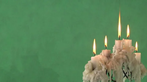 Candles on a green background Video stock 37345563
