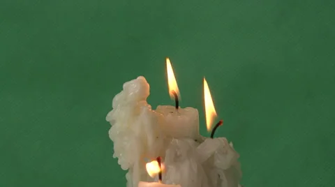 Candles on a green background Video stock 37345787