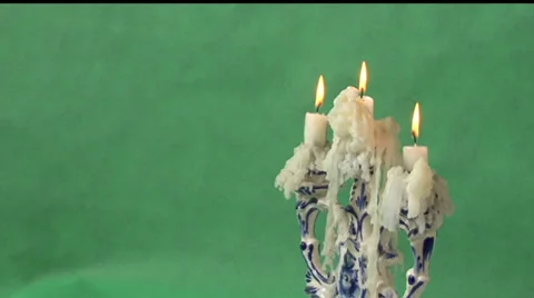 Candles on a green background Video stock 37345931