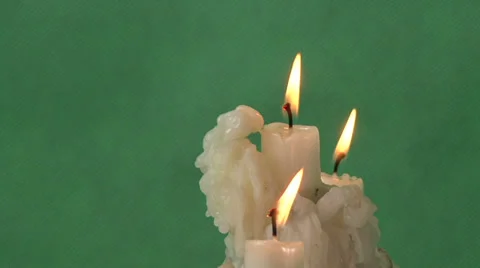 Candles on a green background Video stock 37346009