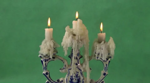 Candles on a green background Video stock 37346026