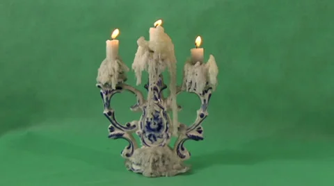 Candles on a green background Video stock 37346056