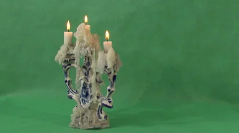 Candles on a green background Video stock 37346131
