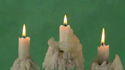 Candles on a green background Stock Footage 37346201