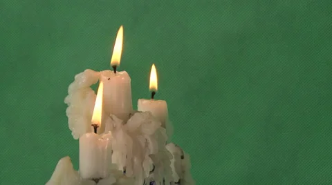 Candles on a green background Stock Footage 37346219