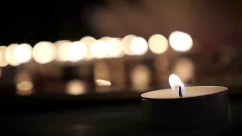 Candles on the ground Stock Footage 73240622