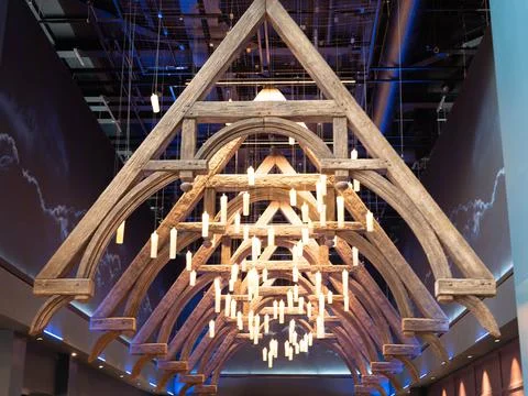 Candles Hanging from triangular ceiling roof Stock Photos