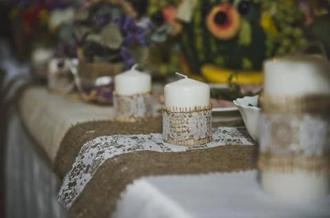 Candles on the holiday table  Stock Photos