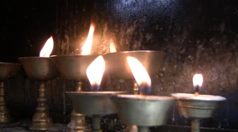 Candles at Holiness Dalai Lama monastery, Mc Leod Ganj-Dharamsala Stock Footage 24802479