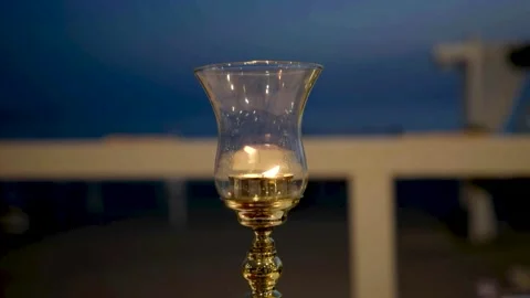 Candles inside a glass cup Stock Footage 157678911