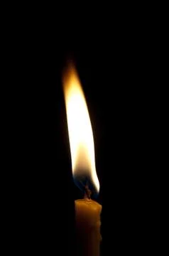 Candles isolated on black background Stock Photos