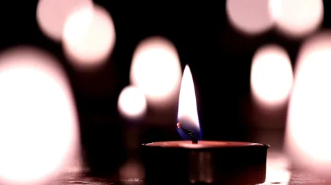 Candles light, black background. Stock Footage 33743151