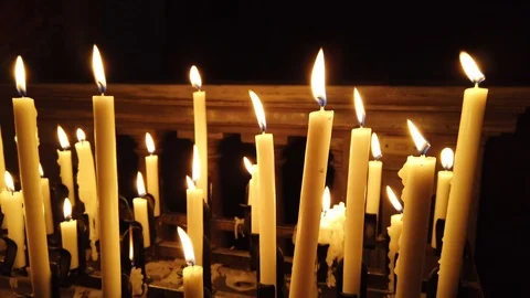 Candles light in the darkness Stock Footage 120931663