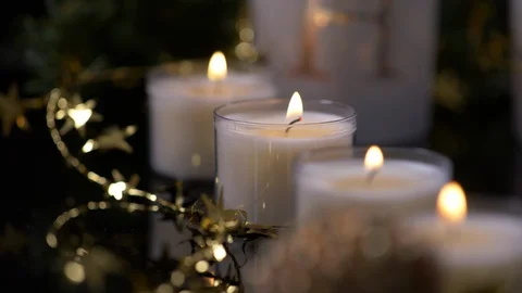 Candles nested in Gold Star Decoration. Christmas Video stock 128746374