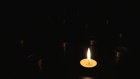 Candles One by One Stock Footage 98679505