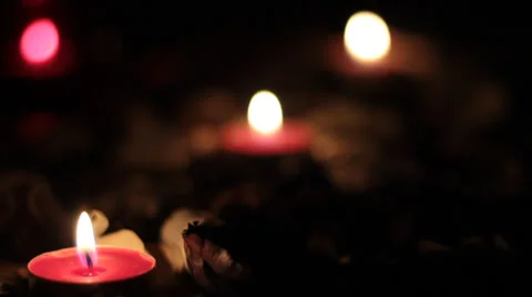 Candles out of focus. Progressively focused tea candles and bluffing. Stock Footage 34926872