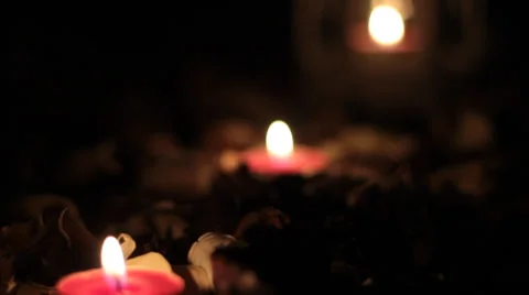 Candles out of focus. Progressively focused tea candles and bluffing. Stock Footage 34927255
