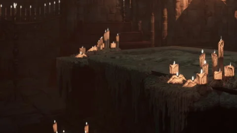 Candles placed on a stone altar in a dimly lit room with stone walls Stock Footage 345060522