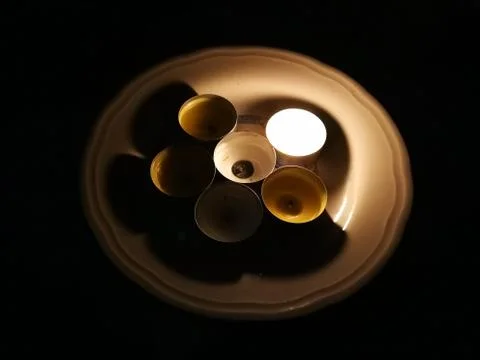 Candles On A Plate Stock Photos