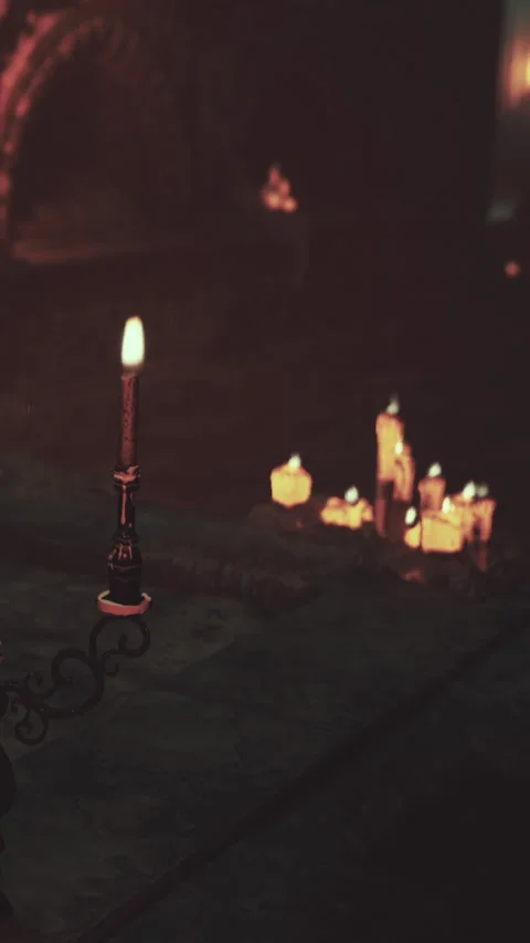Candles provide light in a dark room with flickering flames and shadows Stock Footage 339410724