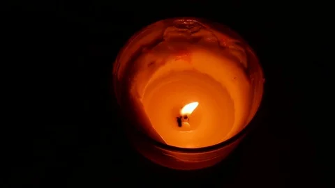 Candles religious theme on black wide perspective Stock Footage 70923911
