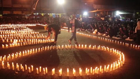 Candles set up for commemorate 7 days after Kanjuruhan stampede Stock Footage 218461238