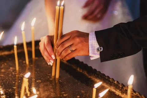 Candles set on fire	 Stock Photos