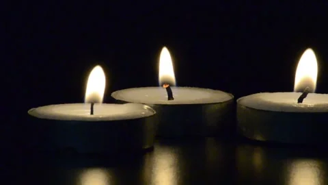 Candles shining in the dark with customizable space for... Stock Footage 295291984